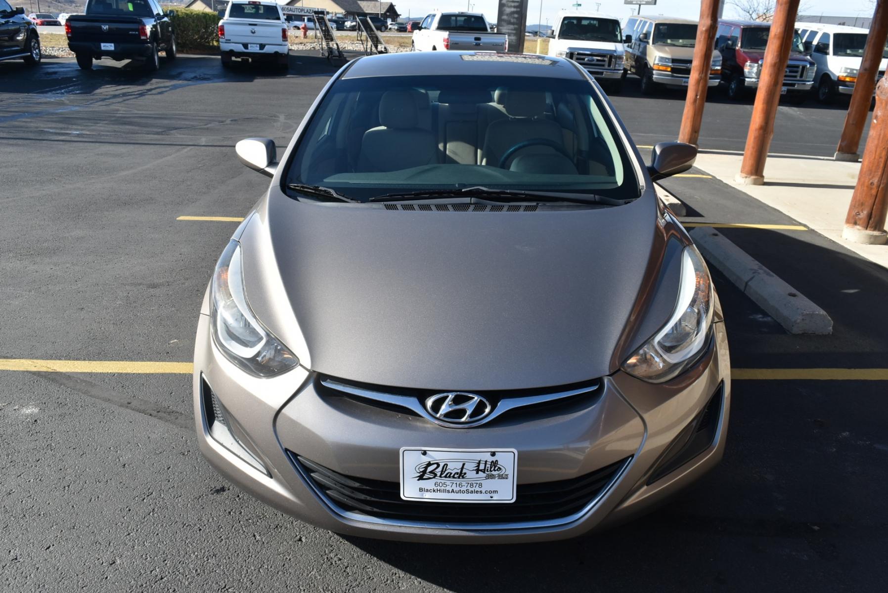 2016 Bronze Hyundai Elantra SE (5NPDH4AE3GH) with an 1.8L 4 Cyl engine, 6-Speed Automatic transmission, located at 1600 E Hwy 44, Rapid City, SD, 57703, (605) 716-7878, 44.070232, -103.171410 - Photo #6